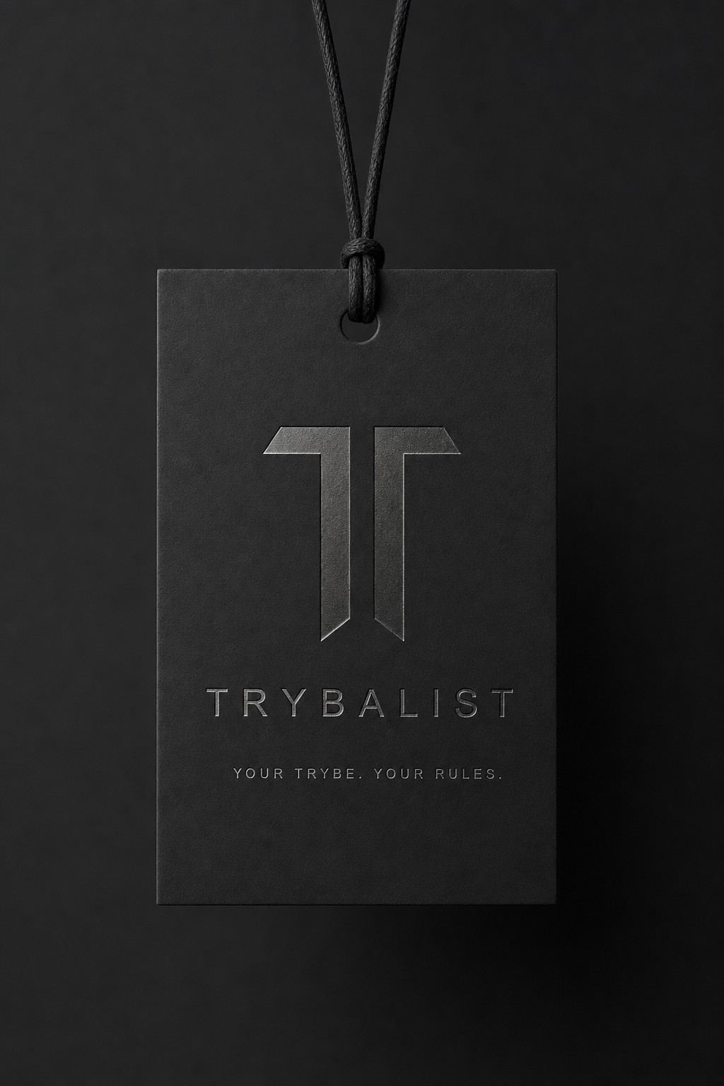 The Trybalist swing tag, flat on stone